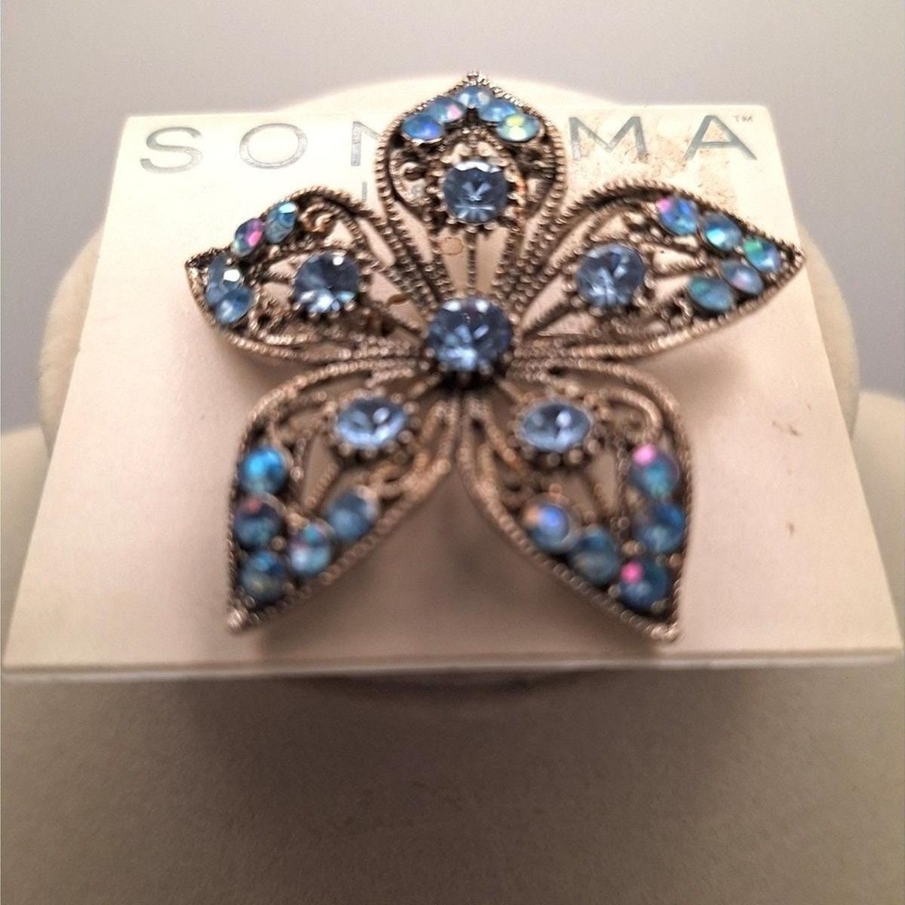 Sonoma flower brooch blue rhinestones filigree gold tone